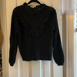 Black ruffle sweater. Great condition, very comfortable.